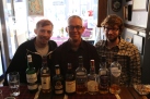 Tom with Jon De Haan, Gabe Spencer, and eight very good Scotches at Rabbie Burns' Pub on the Royal Mile, Edinburgh.
